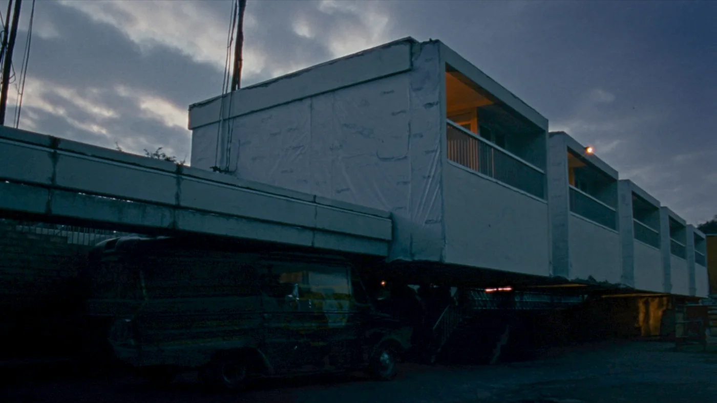 External wall insulation part-rendered on a 1960s housing block